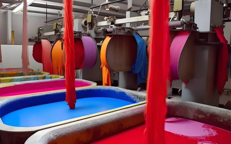 Dye house machines dyeing yarn in bright colors