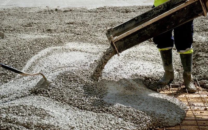 Concrete mix being poured on a construction site